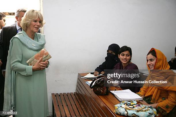 Camilla, Duchess of Cornwall, wearing a traditional Shalwar Kameez, visits an Islamic study class at the all female Fatima Jinnah University on the...