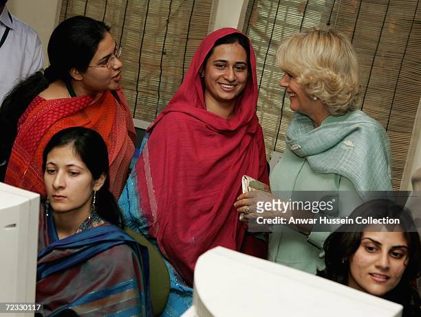 Camilla, Duchess of Cornwall, wearing a traditional Shalwar Kameez, chats to students at the all female Fatima Jinnah University on the third day of...