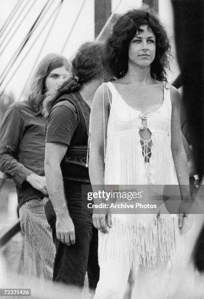 American singer/songwriter Grace Slick with psychedelic rock group Jefferson Airplane at the Woodstock Festival, Bethel, New York, 17th August 1969.