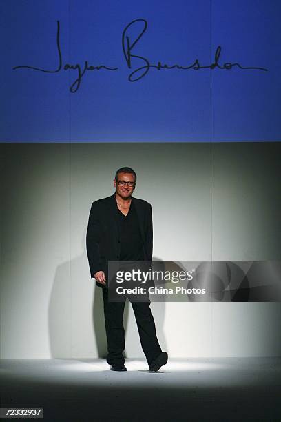 Australian designer Jayson Brunsdon walks the runway during a fashion show of his collections at the 2006 Shanghai Fashion Week on October 31, 2006...