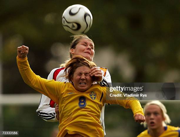 Imke Wuebbenhorst of Germany and Josefin Johansson of Sweden vie for a header during the women's U19 international friendly match between Germany and...