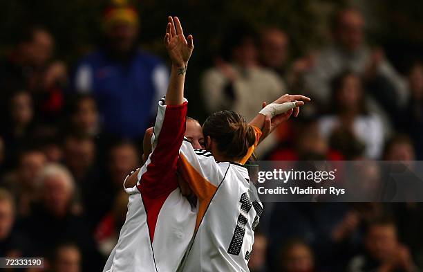 Susanne Hartel celebrates with her team mate Francesca Weber of Germany after scoring the first goal during the women's U19 international friendly...