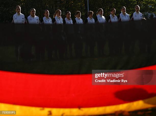 Team Germany lines up for the national anthems prior to the women's U19 international friendly match between Germany and Sweden at the Jahn Stadium...