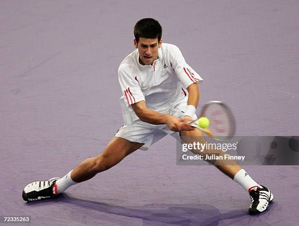 Novak Djokovic of Serbia & Montenegro plays a backhand in his match against Paul-Henri Mathieu of France during day three of the BNP Paribas ATP...