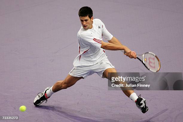 Novak Djokovic of Serbia & Montenegro stretches for a backhand in his match against Paul-Henri Mathieu of France during day three of the BNP Paribas...