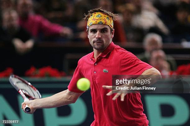 Arnaud Clement of France plays a forehand in his match against James Blake of the United States during day three of the BNP Paribas ATP Tennis...