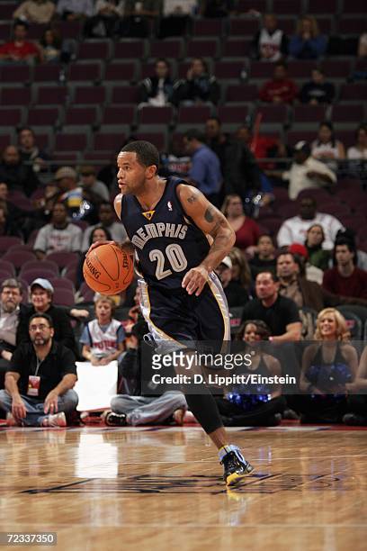 Damon Stoudamire of the Memphis Grizzlies advances the ball up court during a preseason game against the Detroit Pistons at the Palace of Auburn...