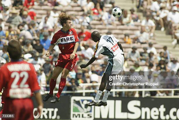 Kelly Gray of the Chicago Fire and Ezra Hendrickson of the Los Angeles Galaxy compete for a header during the second half of their match on June 8,...