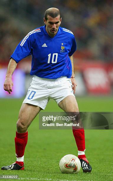 Zinedine Zidane of France runs with the ball during the International Friendly match between France and Russia played at the Stade de France, in St...