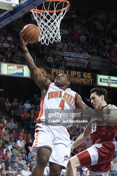 Kantrail Horton of Iowa State shoots on Eduardo Najera of Oklahoma during the Big 12 Conference final at Kemper Arena in Kansas City, Missouri.