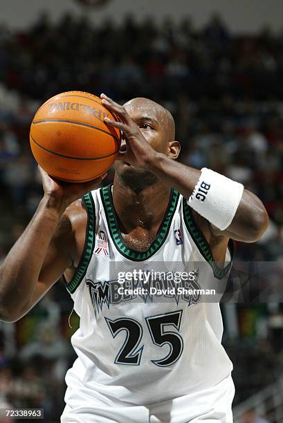 Marc Jackson of the Minnesota Timberwolves shoots a free throw after being fouled by a Golden State Warriors at Target Center in Minneapolis,...