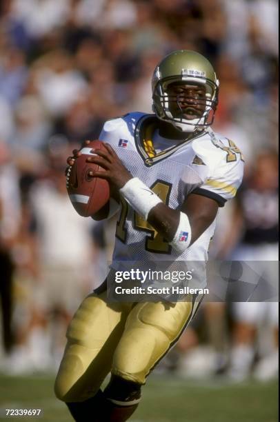 Quarterback Joe Hamilton of the Georgia Tech Yellow Jackets in action during the game against the Virginia Cavaliers at the Bobby Dodd Stadium in...