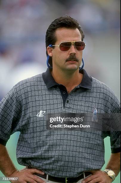 Head coach Jeff Fisher of the Tennessee Oilers looks on during the game against the Cincinnati Bengals at the Vanderbilt Stadium in Nashville,...