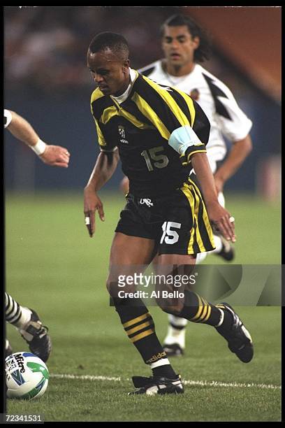 Doctor Khumalo of the Coumbus Crew fights for the ball during an MLS game against the New York/New Jersey Metrostars playued at the Meadowlands in...