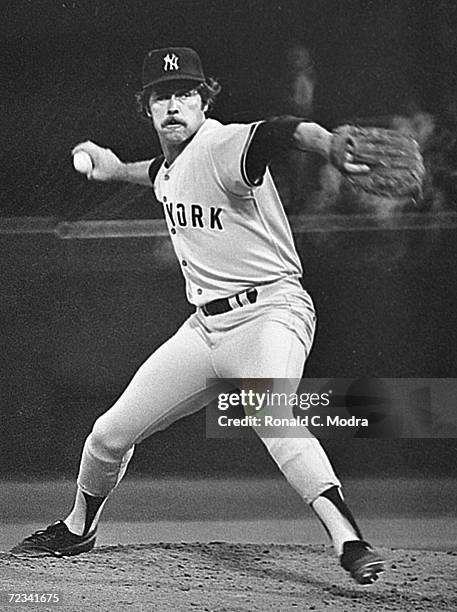 Jim Catfish Hunter of the New York Yankees pitching during a game against the Milwaukee Brewers at County Stadium in the late 1970s in Milwaukee,...