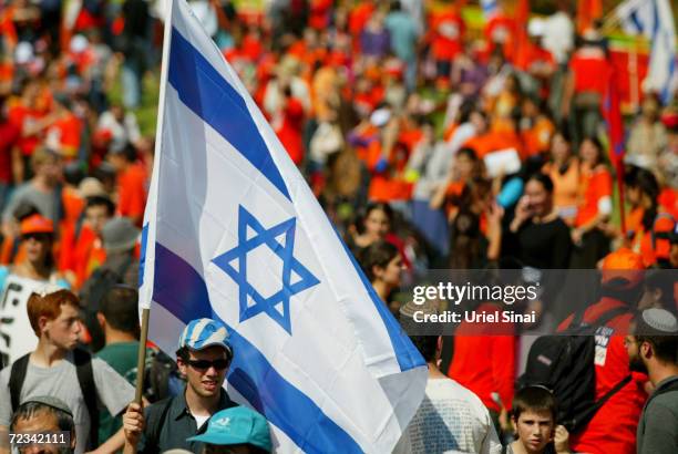 Israeli settlers demonstrate against Israeli Prime Minister Ariel Sharon's Gaza Strip disengagement plan outside the Knesset, Israel's parliament,...