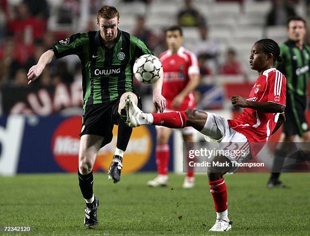 Nelson of Benfica tangles with Stephen Pearson of Celtic during the UEFA Champions League group A match between Benfica and Celtic at the Estadio da...