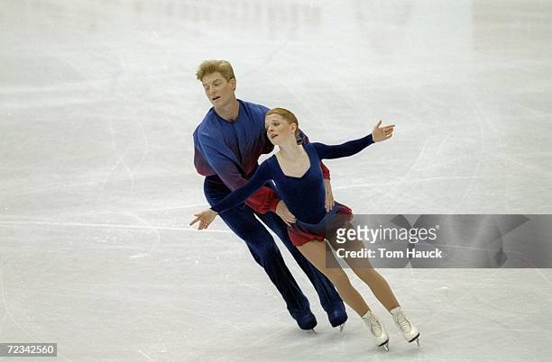 Jenni Meno/USA skates with her partner Todd Sands/USA in the Pairs competition during the World Figure Skating Championships at Target Center Arena...