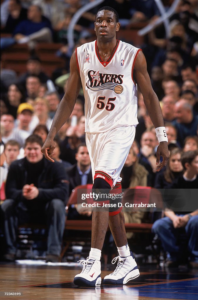 Mutombo Height Dikembe Mutombo of the Philadelphia 76ers walks on the court during ...