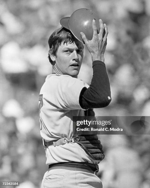 Carlton Fisk of the Boston Red Sox during a game against the Milwaukee Brewers at County Stadium in the 1970s in Milwaukee, Wisconsin.