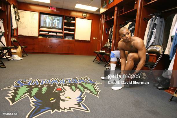 Randy Foye of the Minnesota Timberwolves gets dressed in the locker room in preparation for his first NBA game against the Sacramento Kings on...