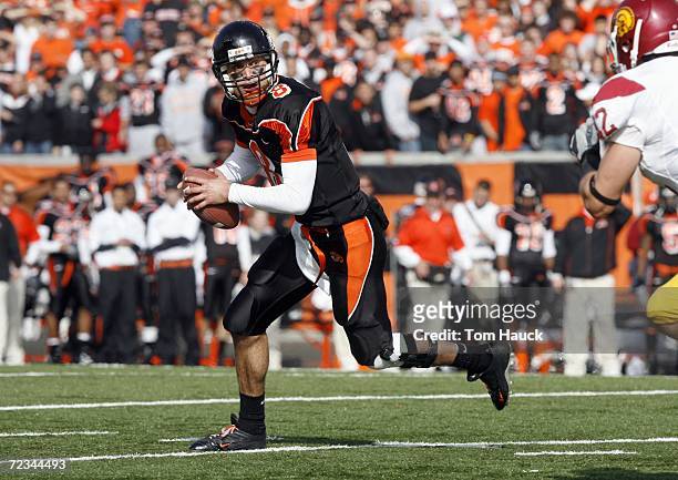 Matt Moore of the Oregon State Beavers runs with the ball during the game against the Southern California Trojans at Reser Stadium on October 28,...