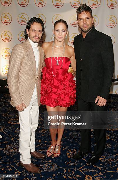 Actress Jennifer Lopez and her husband singer Marc Anthony pose with singer Ricky Martin at the 2006 Latin Recording Academy Person Of The Year...