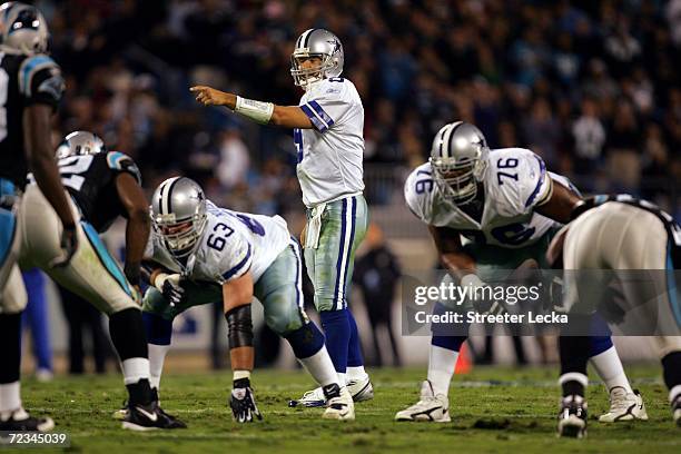 Quarterback Tony Romo of the Dallas Cowboys calls a play against the Carolina Panthers during the game on October 29, 2006 at Bank of America Stadium...