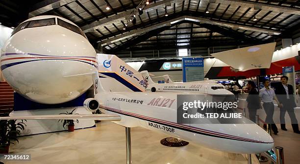 Models of ARJ21 commercial passenger jets developed by China are displayed at the 6th China International Aviation and Aerospace Exhibition in...