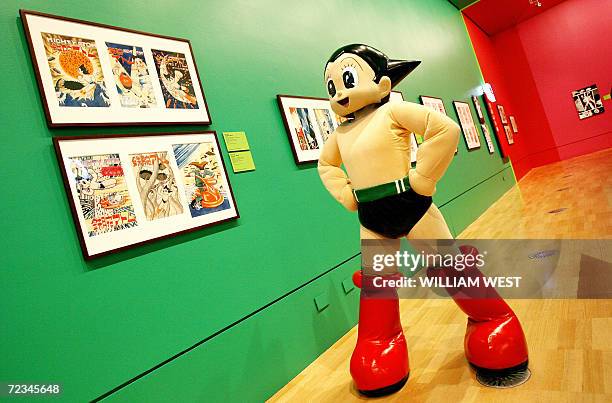 Astro Boy inspects the work at Melbourne's National Gallery of Victoria launch of 'Tezuka: the Marvel of Manga' exhibition, 02 November 2006. In...
