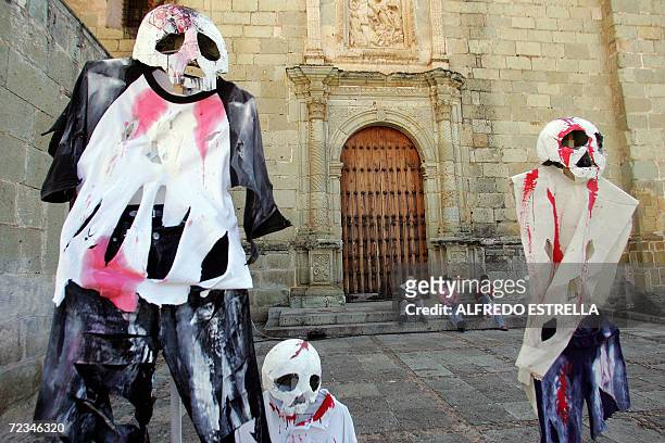 Offerings, made by members of the Oaxaca's People Popular Assembly , are set up in front of a church during the celebration of the All Souls' Day in...