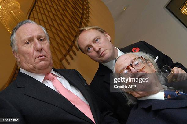 United Kingdom: British authors Sir John Mortimer, Frederick Forsyth and historian Andrew Roberts pose for a photocall at the Dorchester Hotel in...