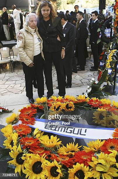 Dalia Rabin , the daughter of the late Israeli prime minister Yitzhak Rabin, and Rabin's sister, Rahel Yaakov, stand by his grave during a memorial...