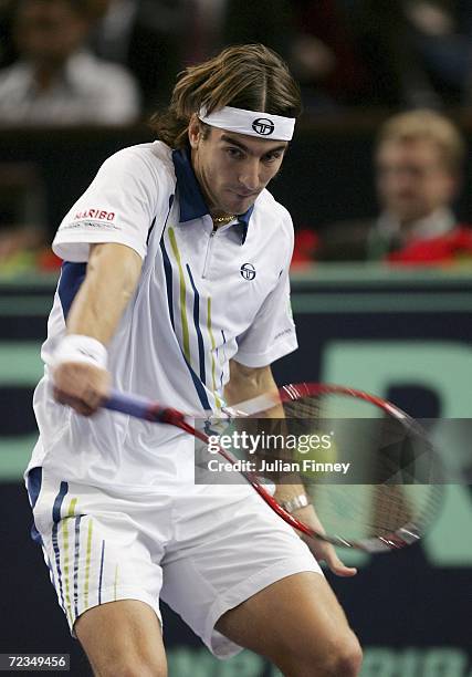 Tommy Robredo of Spain plays a backhand in his match against Paul-Henri Mathieu of France in the third round during day four of the BNP Paribas ATP...