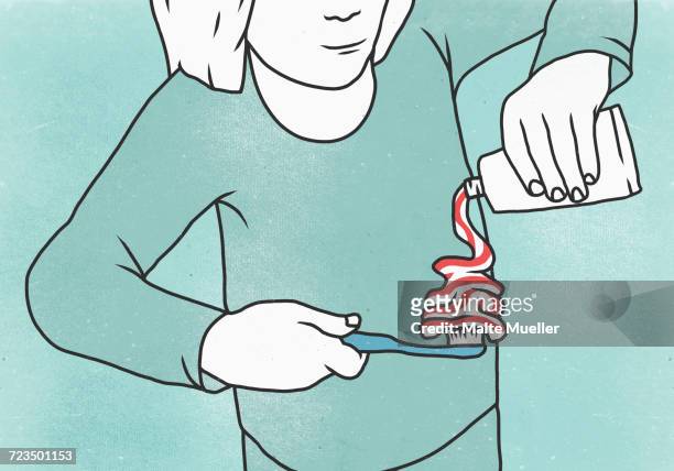 illustration of woman putting toothpaste on toothbrush - zahnbürste stock-grafiken, -clipart, -cartoons und -symbole