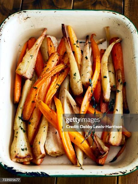 tray of roasted carrots and parsnips - roasted stock pictures, royalty-free photos & images