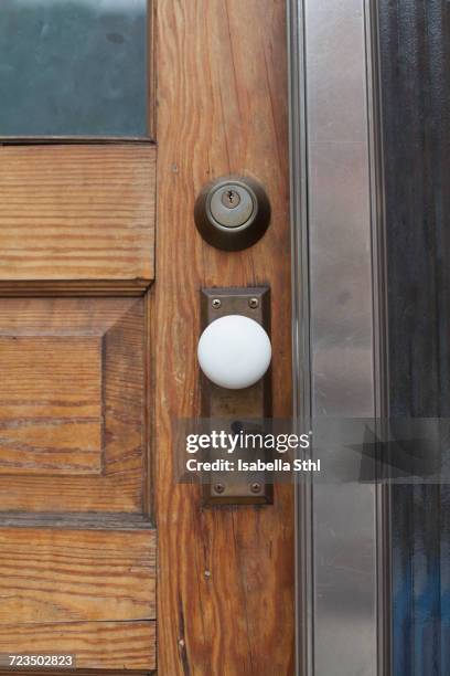 close-up of closed wooden door - key hole stock pictures, royalty-free photos & images
