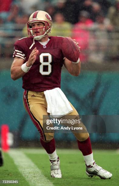 Steve Young of the San Francisco 49ers gets ready to pass the ball during the game against the Jacksonville Jaguars at the Alltell Stadium in...