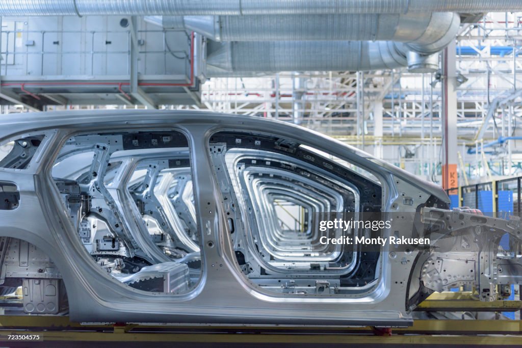 View of cars on production line in factory