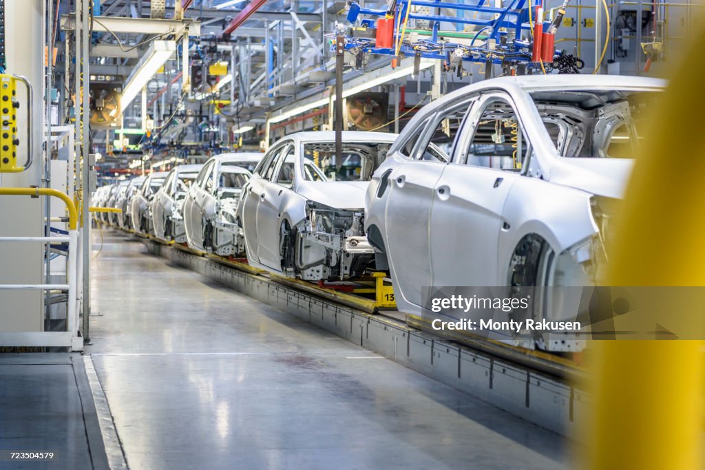 View of cars on production line in factory
