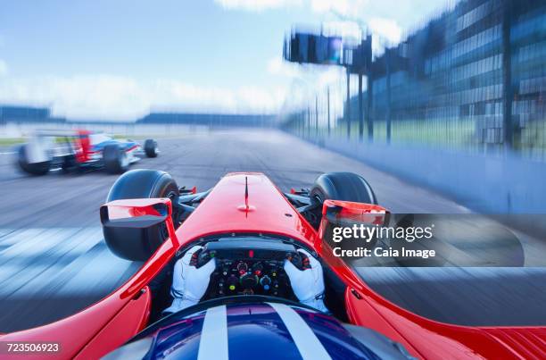 personal perspective open-wheel single-seater racing car race car driver speeding on race track - personal perspective or pov ストックフォトと画像