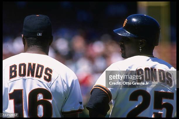 Bobby Bonds and son Barry of the San Francisco Giants look on during a game against the Florida Marlins at 3Com Park in San Francisco, California....