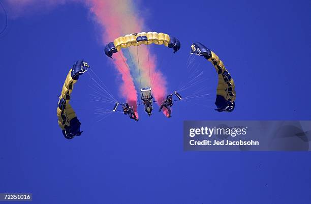 Parachuter flys in the air during the pre-game show before the game between the St. Louis Rams and the San Francisco 49ers at 3 Comm Park in San...