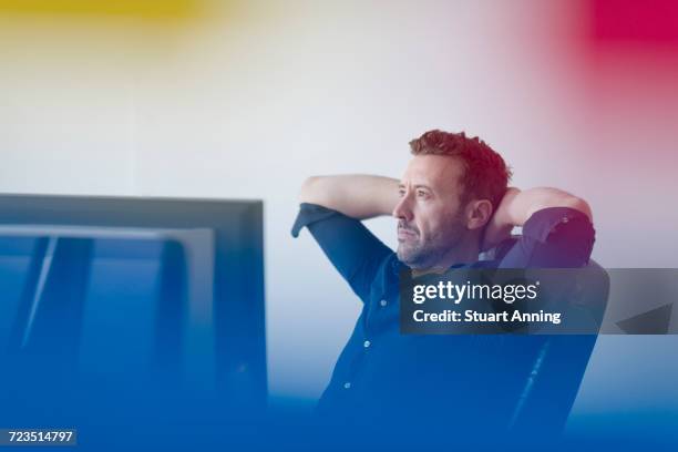 man looking away from computer - soft focus office stock pictures, royalty-free photos & images