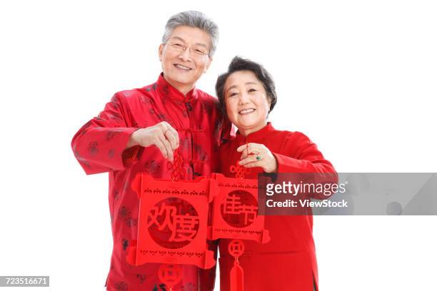 the old couple celebrate the new year - 65 year old asian women ストックフォトと画像