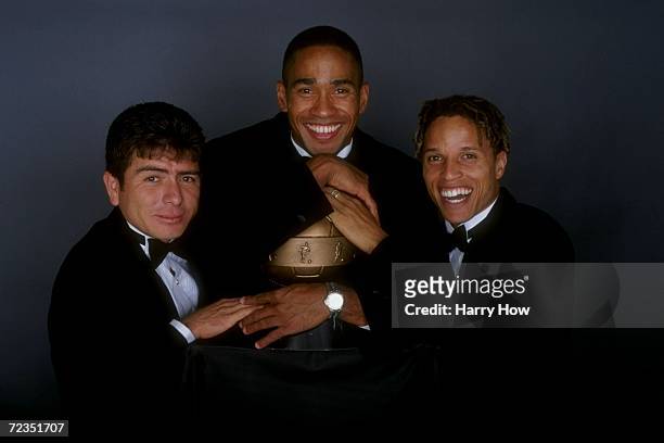 Maruicio Cienfuegos, Robin Fraser and Cobi Jones pose for a picture during the MLS Gala at the Century Plaza Hotel in Los Angeles, California....