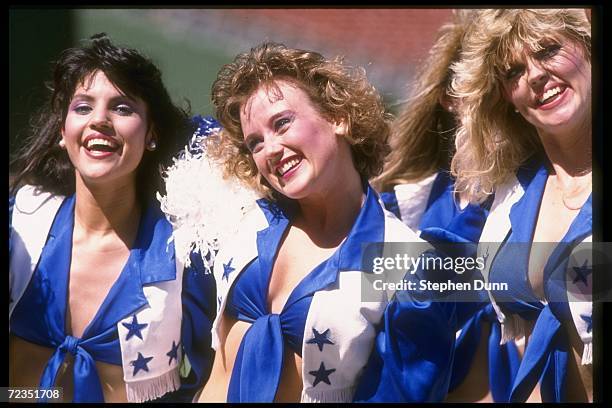 Dallas Cowboys cheerleaders look on during the Cowboys 20-3 pre-season victory over the San Diego Chargers at Jack Murphy Stadium in San Diego,...