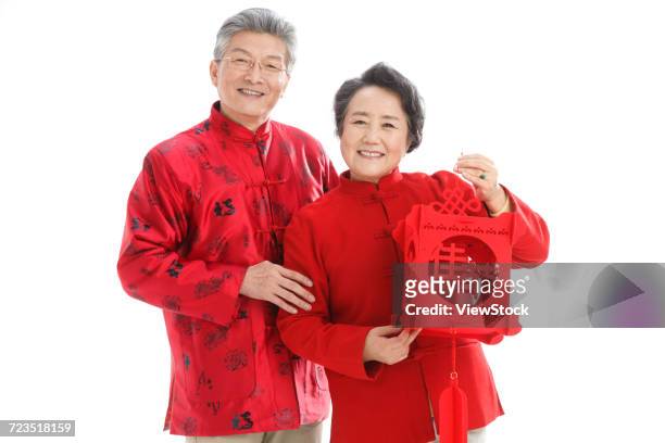 the old couple celebrate the new year - 65 year old asian women ストックフォトと画像