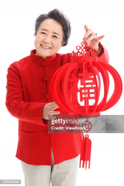 the old woman celebrates the new year - 65 year old asian women ストックフォトと画像