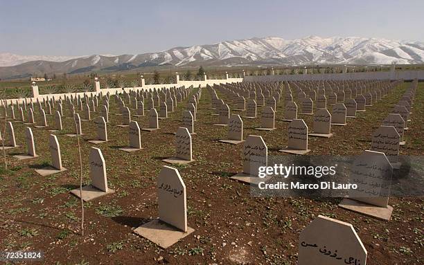 The mass grave site of most of the victims of the March 16, 1988 chemical attacks on Halabja is shown February 24, 2004 in Halabja, Iraq. In Halabja,...